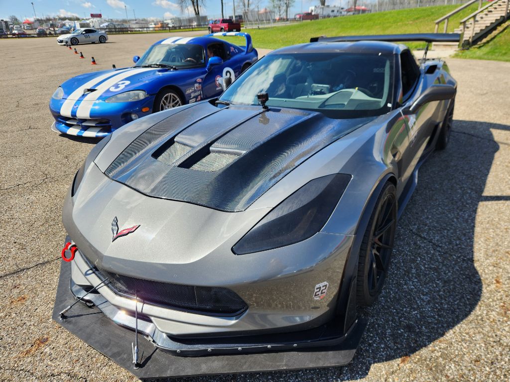 Corvette #22 at speed in the rain · track racing